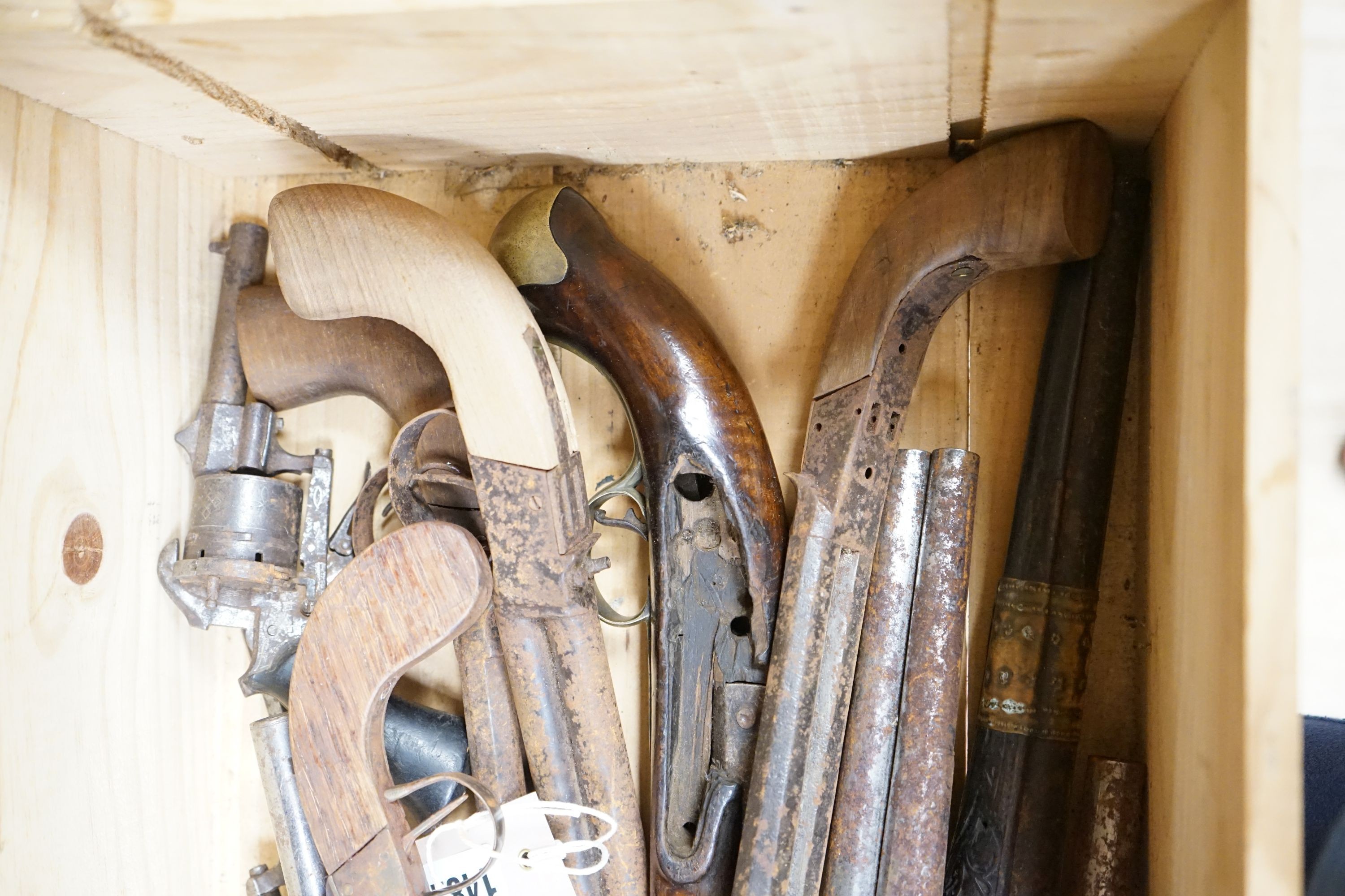 A group of percussion cap pistols and pin fire revolvers, 19th century, for restoration.